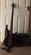Black Ibanez Mikro Bass Guitar With Black Kustom Amplifier