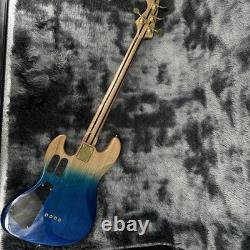 Custom 4-string bass electric guitar with maple fingerboard, mahogany body