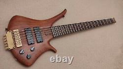 Hand made headless neck through 6-string electric bass guitar