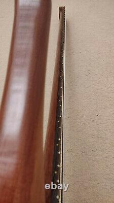 Hand made headless neck through 6-string electric bass guitar