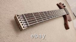 Hand made headless neck through 6-string electric bass guitar