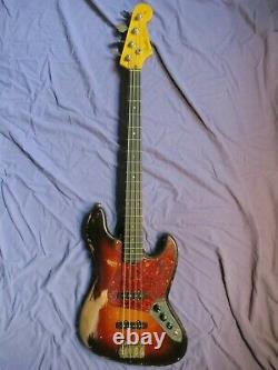 Partscaster Jazz Bass, Fender neck, alder body, road-worn, tobacco sunburst