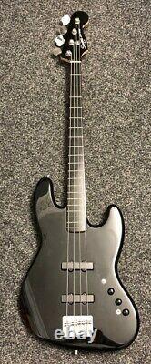 Squier Jazz Bass by Fender WAR016500177604. QS