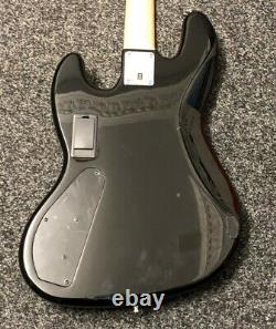 Squier Jazz Bass by Fender WAR016500177604. QS