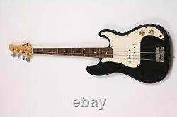 Starmaker bass guitar in black and white good condition some scuffs see pics
