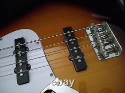 Used Rocket music Sunburst electric bass guitar left handed for beginner's