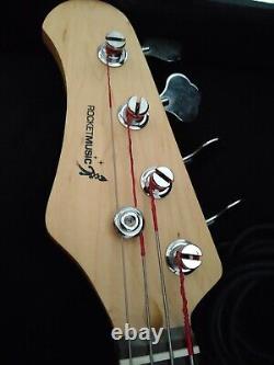 Used Rocket music Sunburst electric bass guitar left handed for beginner's