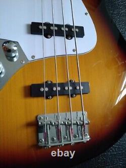 Used Rocket music Sunburst electric bass guitar left handed for beginner's