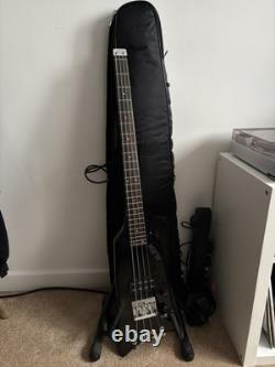 Vintage 80s Hondo Alien Bass guitar. Great Condition. Comes With Thick Case