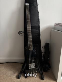 Vintage 80s Hondo Alien Bass guitar. Great Condition. Comes With Thick Case